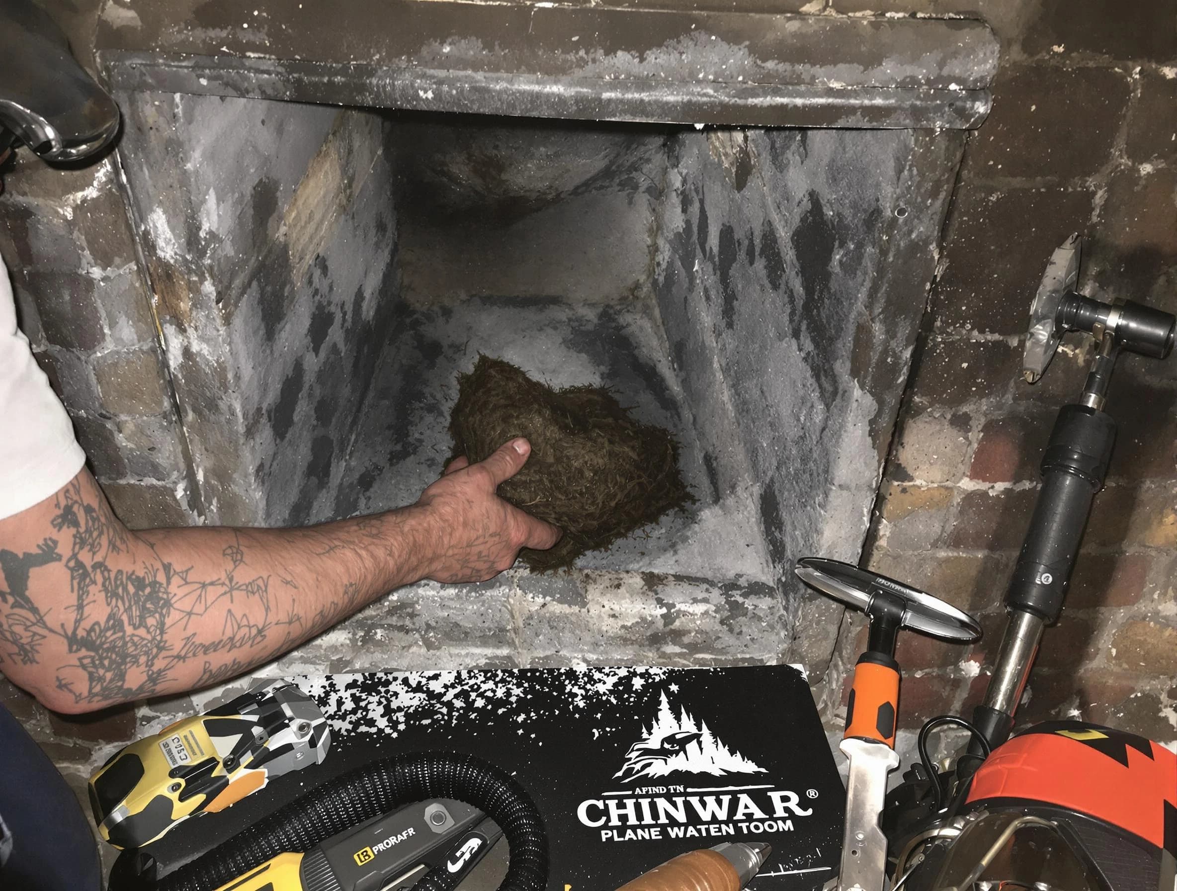 Berthoud Chimney Sweep safely removing debris and screening chimney in Berthoud, CO